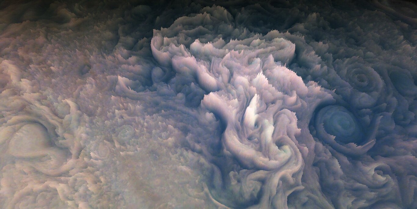 Посмотрите на «морозные» облака Юпитера необычной формы